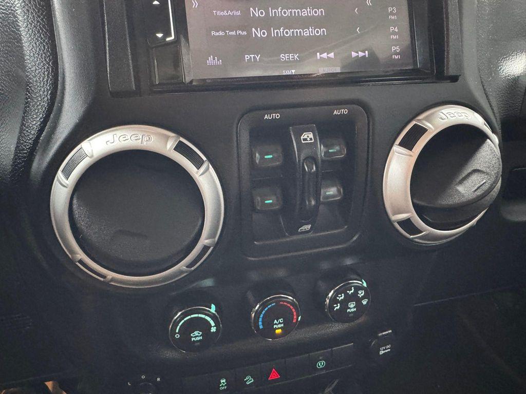 used 2014 Jeep Wrangler Unlimited car, priced at $14,995