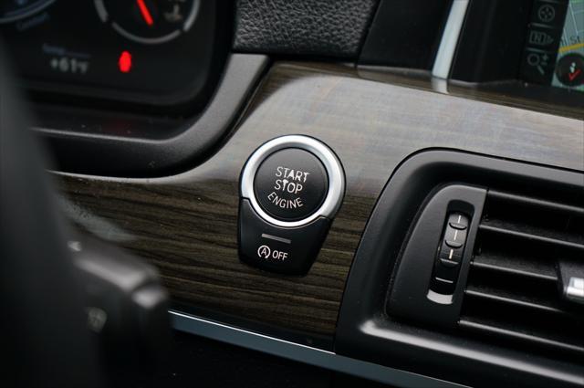 used 2014 BMW M5 car, priced at $35,499
