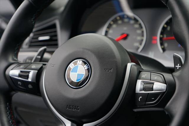 used 2014 BMW M5 car, priced at $35,499