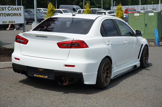 used 2014 Mitsubishi Lancer Evolution car, priced at $31,995