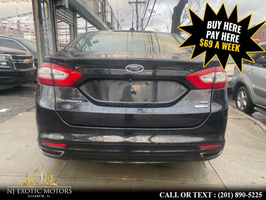 used 2015 Ford Fusion car, priced at $4,200