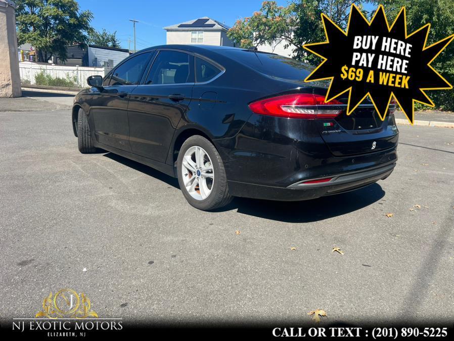 used 2018 Ford Fusion car, priced at $15,995