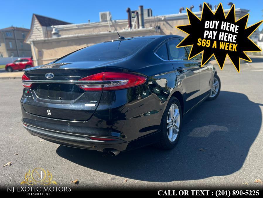 used 2018 Ford Fusion car, priced at $15,995