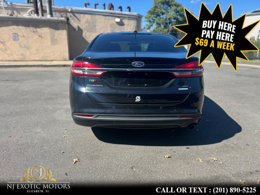 used 2018 Ford Fusion car, priced at $15,995