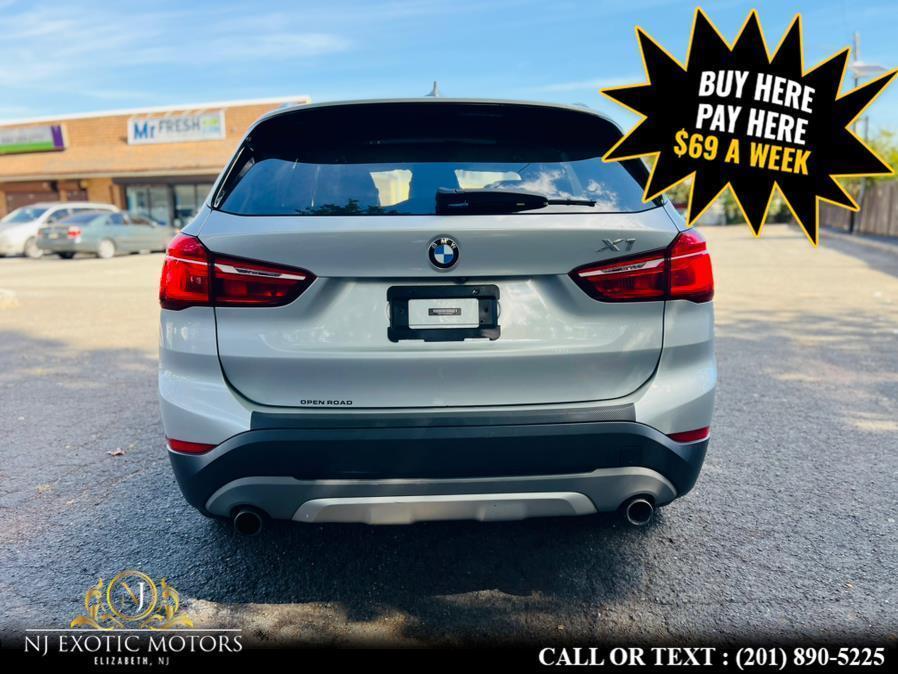 used 2018 BMW X1 car, priced at $10,995