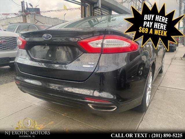 used 2015 Ford Fusion car, priced at $3,995