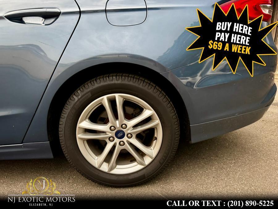 used 2018 Ford Fusion car, priced at $10,900