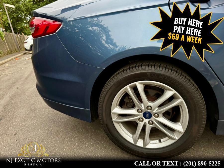 used 2018 Ford Fusion car, priced at $10,900
