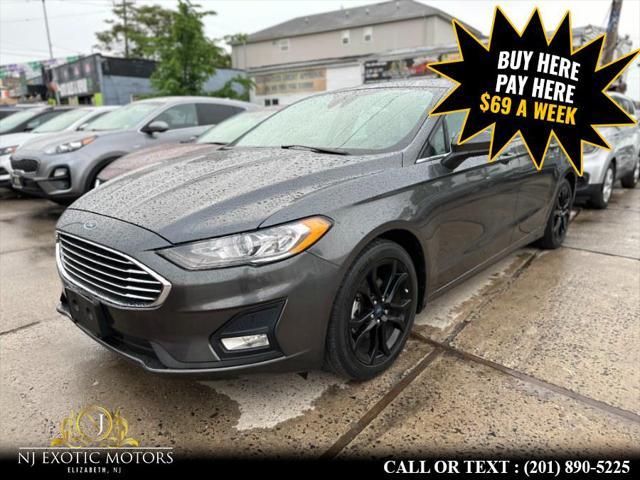 used 2019 Ford Fusion car, priced at $12,595