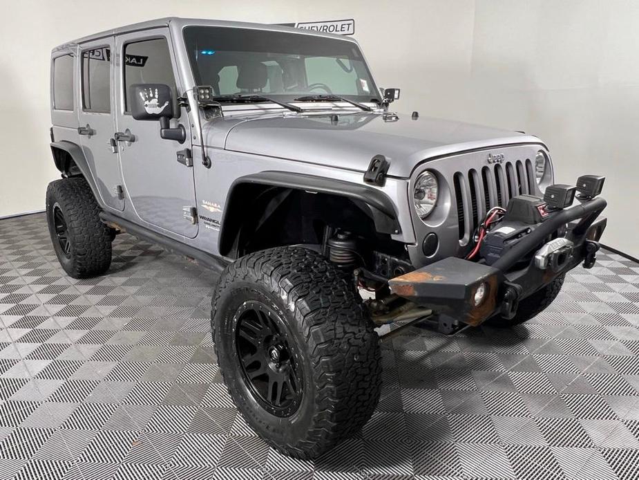 used 2013 Jeep Wrangler Unlimited car, priced at $16,777