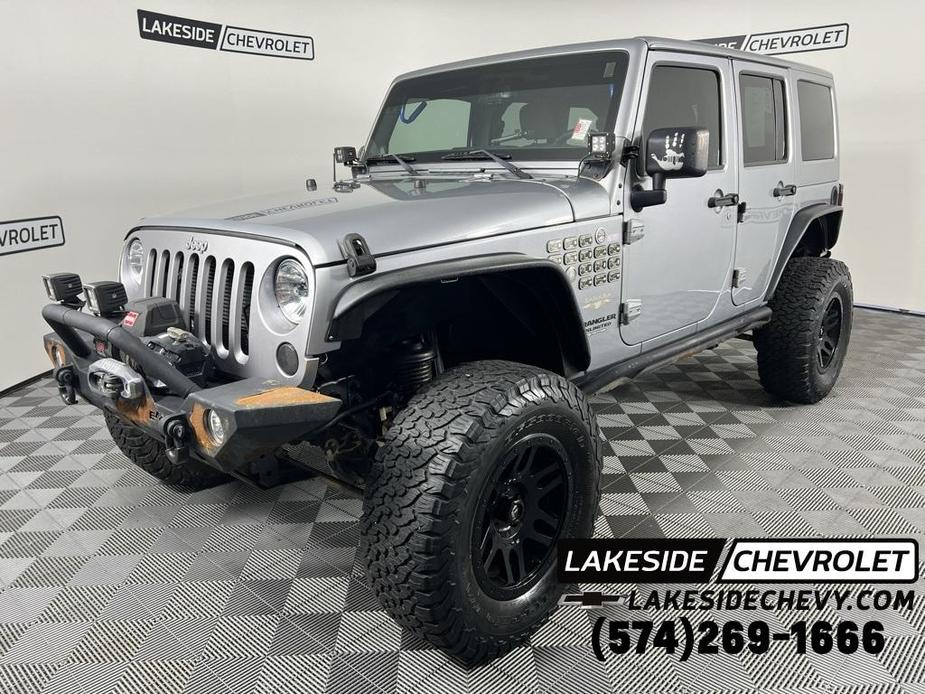 used 2013 Jeep Wrangler Unlimited car, priced at $17,257