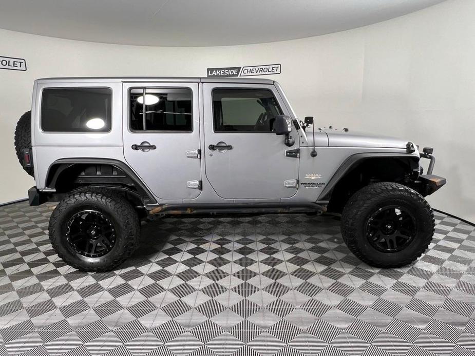 used 2013 Jeep Wrangler Unlimited car, priced at $16,777