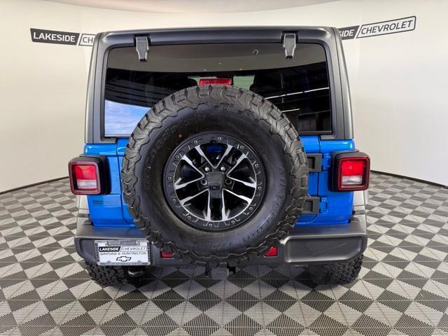 used 2024 Jeep Wrangler car, priced at $44,495