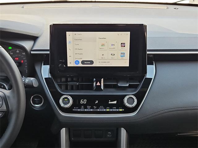 used 2023 Toyota Corolla Cross Hybrid car, priced at $29,486