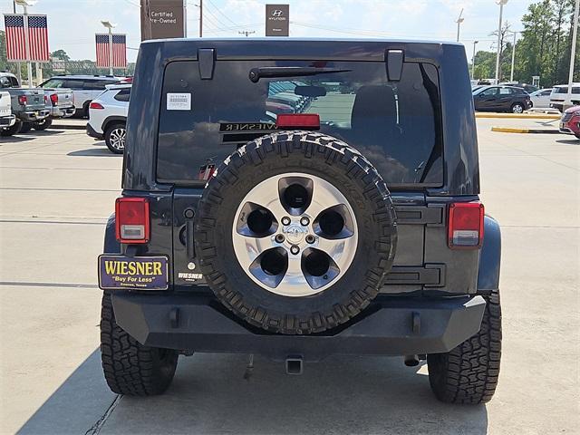 used 2016 Jeep Wrangler Unlimited car, priced at $16,484