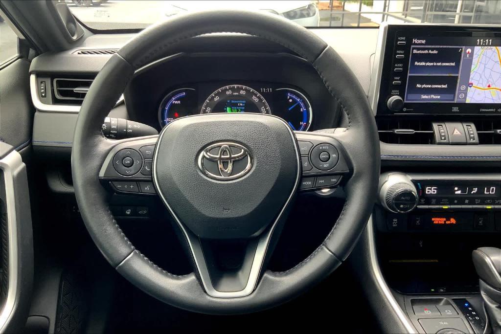 used 2021 Toyota RAV4 Hybrid car, priced at $30,800