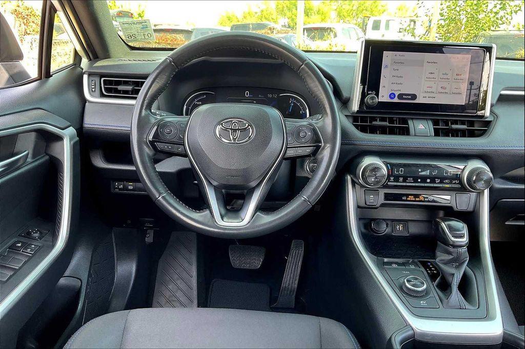 used 2024 Toyota RAV4 Hybrid car, priced at $25,995