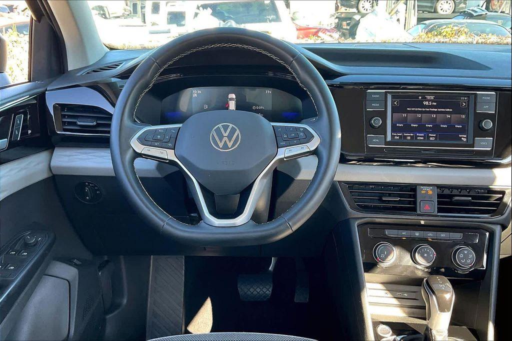 used 2024 Volkswagen Taos car, priced at $18,573
