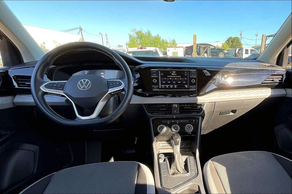 used 2024 Volkswagen Taos car, priced at $18,573