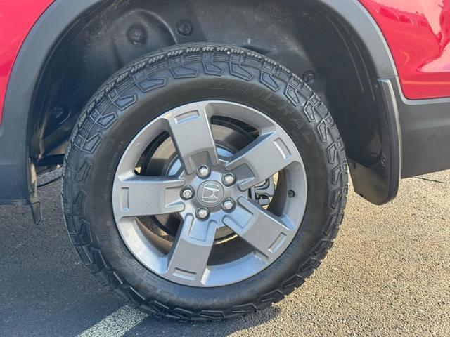 used 2025 Honda Ridgeline car, priced at $40,599