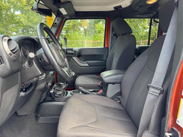 used 2014 Jeep Wrangler Unlimited car, priced at $16,298