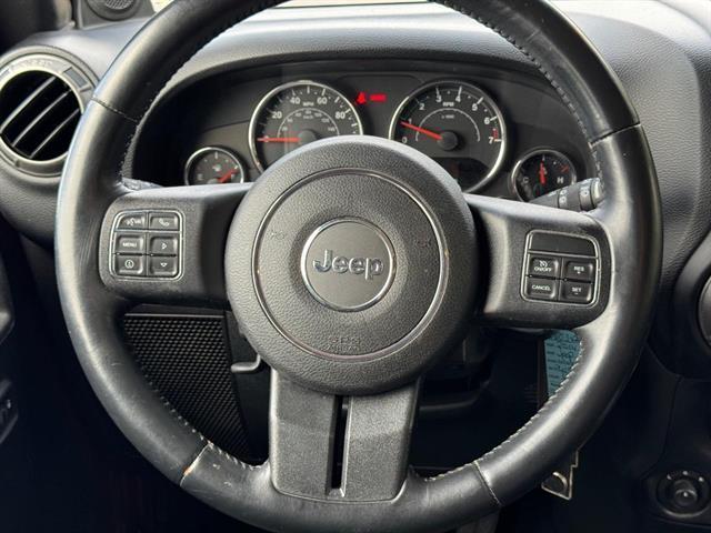 used 2014 Jeep Wrangler Unlimited car, priced at $16,298