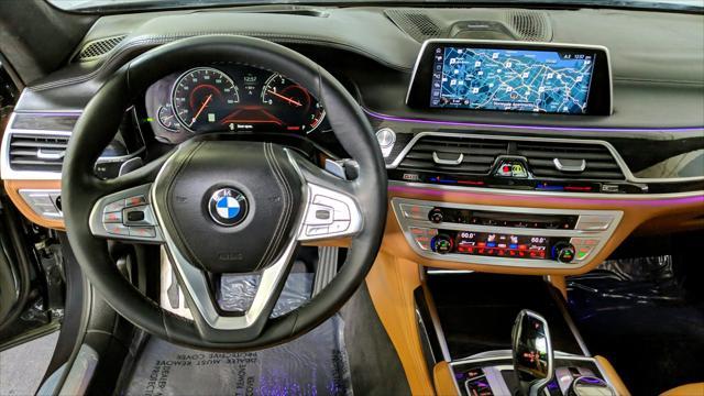 used 2016 BMW 750 car, priced at $23,777