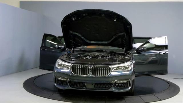 used 2016 BMW 750 car, priced at $23,777