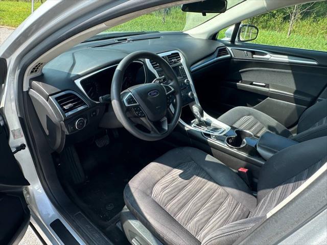 used 2016 Ford Fusion car, priced at $7,695