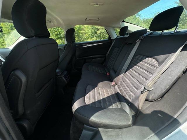 used 2016 Ford Fusion car, priced at $7,695