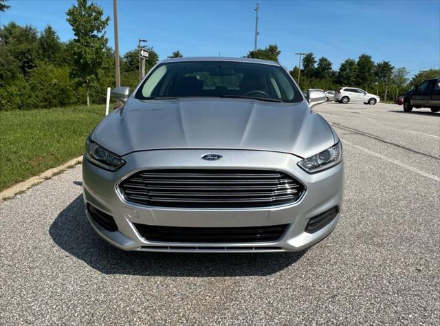 used 2016 Ford Fusion car, priced at $7,695