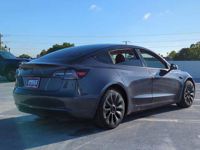 used 2023 Tesla Model 3 car, priced at $22,999