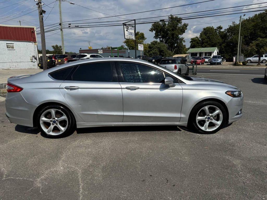 used 2014 Ford Fusion car, priced at $4,900