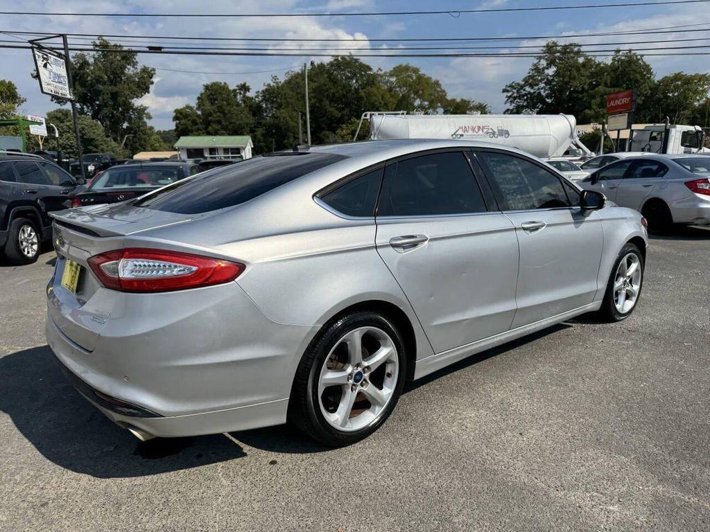 used 2014 Ford Fusion car, priced at $4,900