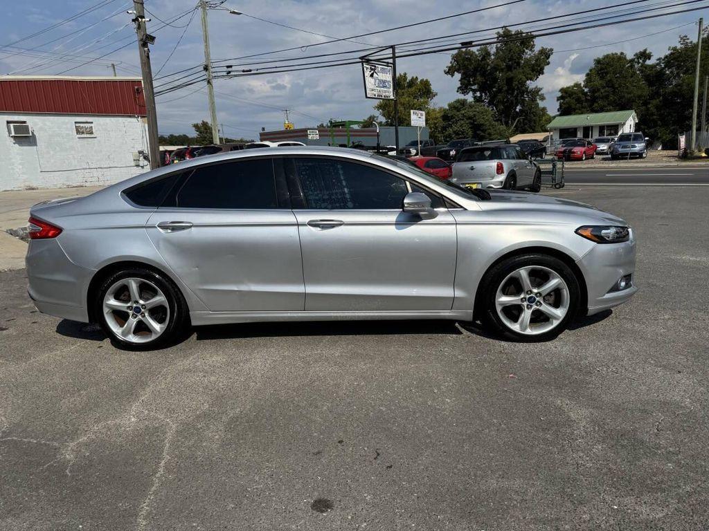 used 2014 Ford Fusion car, priced at $4,900