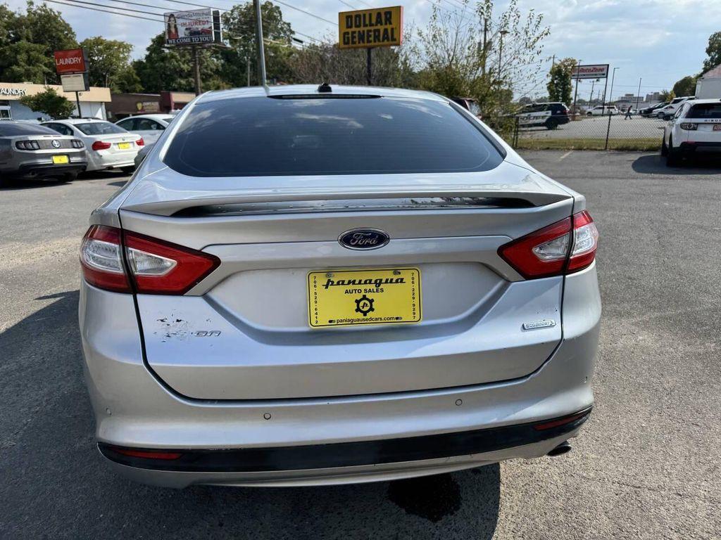 used 2014 Ford Fusion car, priced at $4,900