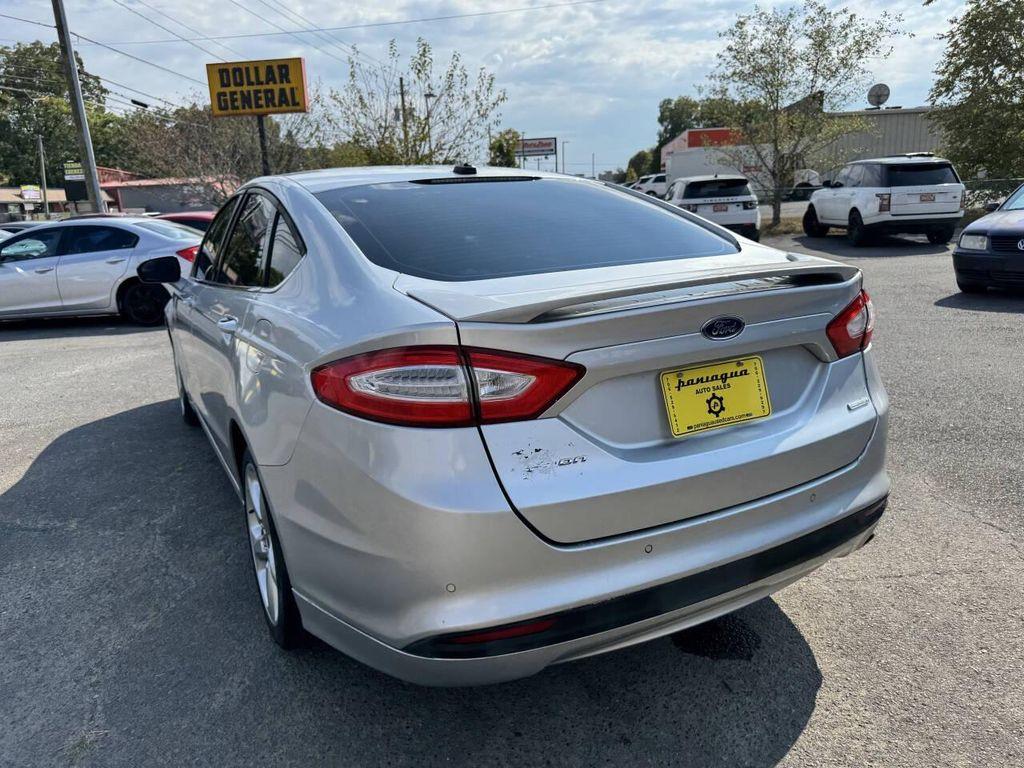 used 2014 Ford Fusion car, priced at $4,900