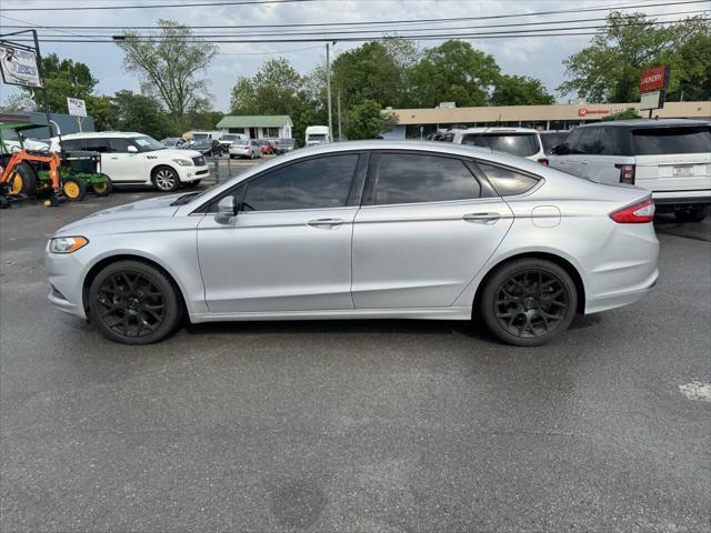 used 2016 Ford Fusion car, priced at $5,995