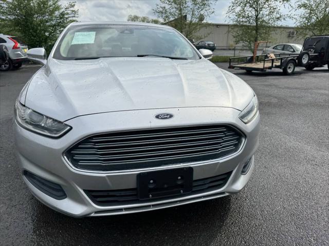 used 2016 Ford Fusion car, priced at $5,995
