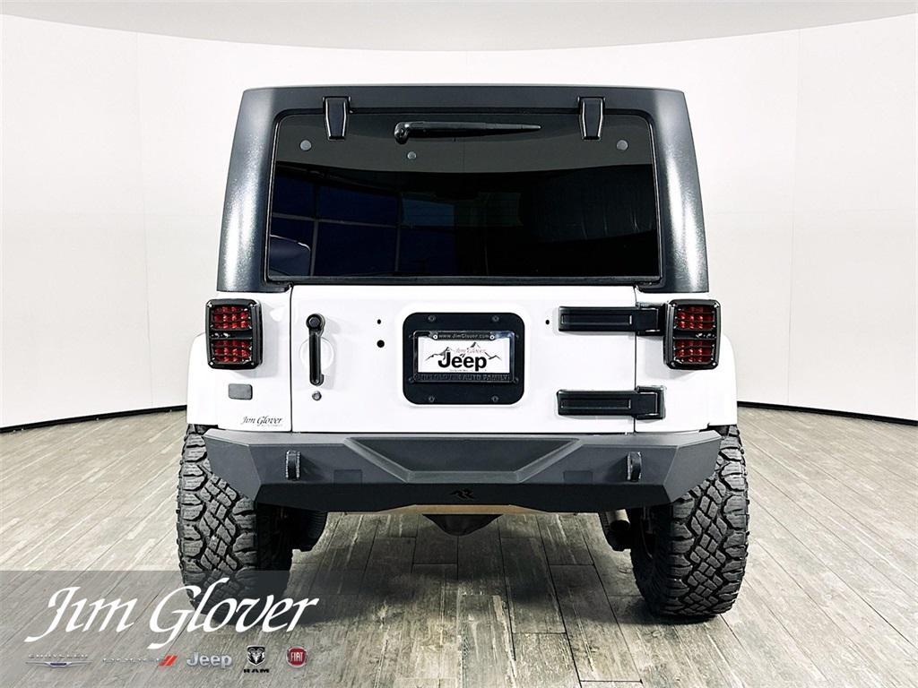 used 2014 Jeep Wrangler Unlimited car, priced at $25,379