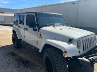 used 2014 Jeep Wrangler Unlimited car, priced at $24,979