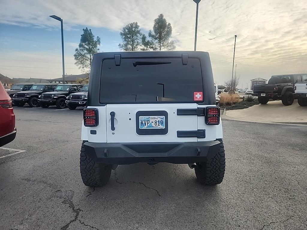 used 2014 Jeep Wrangler Unlimited car, priced at $24,979