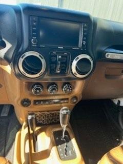 used 2014 Jeep Wrangler Unlimited car, priced at $24,979