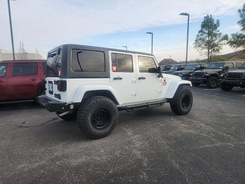 used 2014 Jeep Wrangler Unlimited car, priced at $24,979