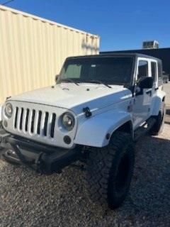 used 2014 Jeep Wrangler Unlimited car, priced at $24,979