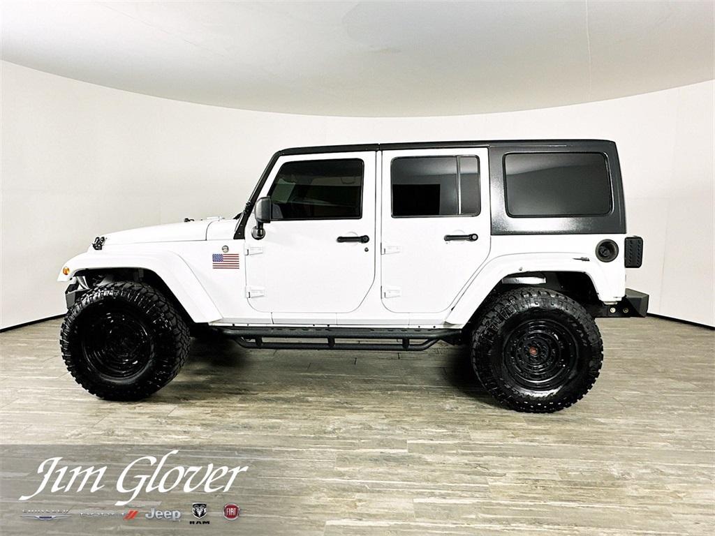 used 2014 Jeep Wrangler Unlimited car, priced at $25,379