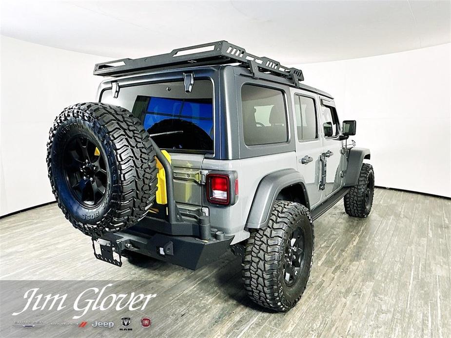 used 2021 Jeep Wrangler Unlimited car, priced at $31,310