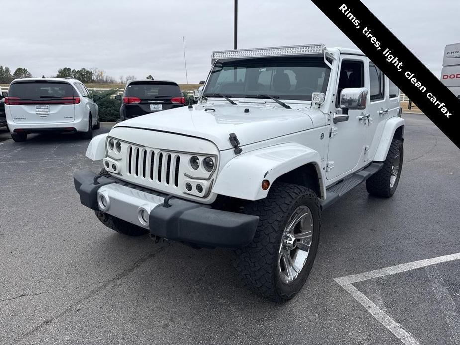 used 2012 Jeep Wrangler Unlimited car, priced at $15,411