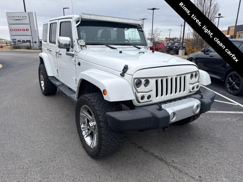 used 2012 Jeep Wrangler Unlimited car, priced at $15,411