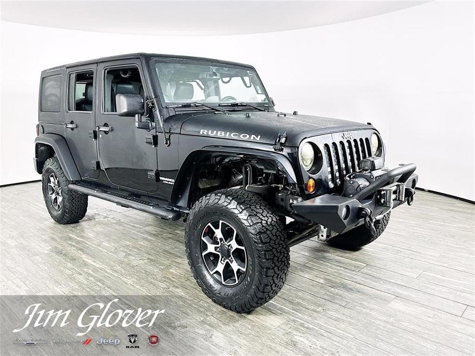 used 2013 Jeep Wrangler Unlimited car, priced at $17,887